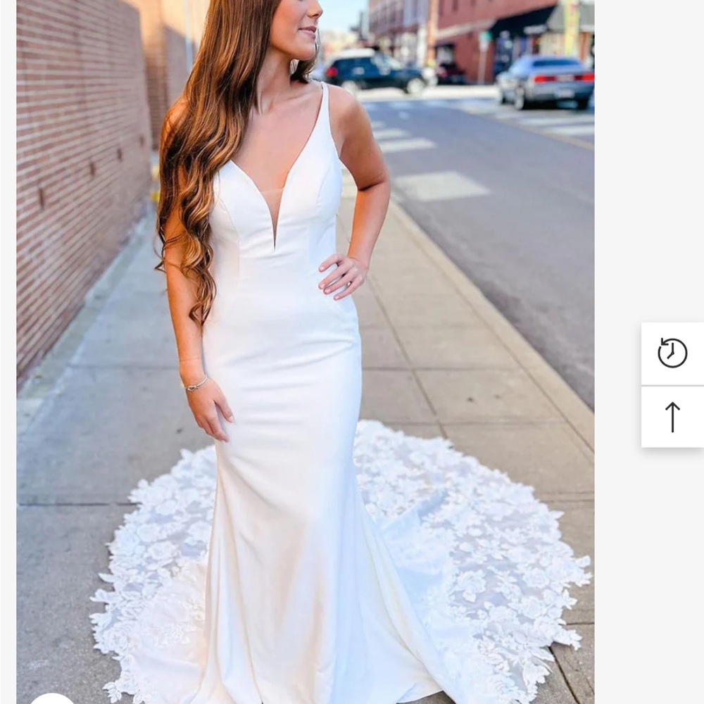 Elegant White Gown with Lace Train